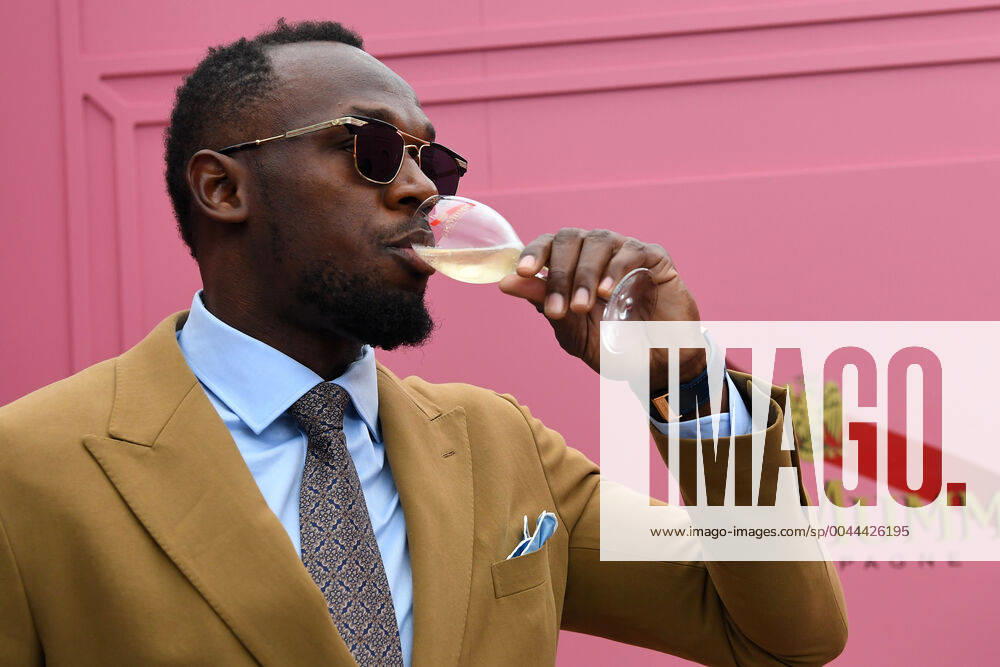 RACING OAKS DAY COLOUR, Usain Bolt (left) is seen in the Mumm marquee during Oaks Day at Flemington Racecourse in Melbourne, Thursday, November 7, 2019. ( NO ARCHIVING, , NO USE IN BOOKS WITHOUT CONSENT MELBOURNE VIC AUSTRALIA