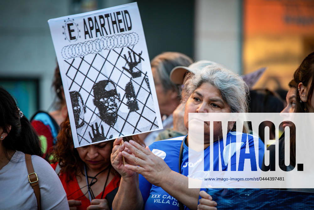 A protester holds a placard during a rally. Concentration in the Plaza de Callao in Madrid called by social entities and associations of the migrant movement against the European Pact on Migration and Asylum, which is being debated and voted on these days in the European Parliament. Madrid Spain - ZUMAs197 20240411_aaa_s197_587