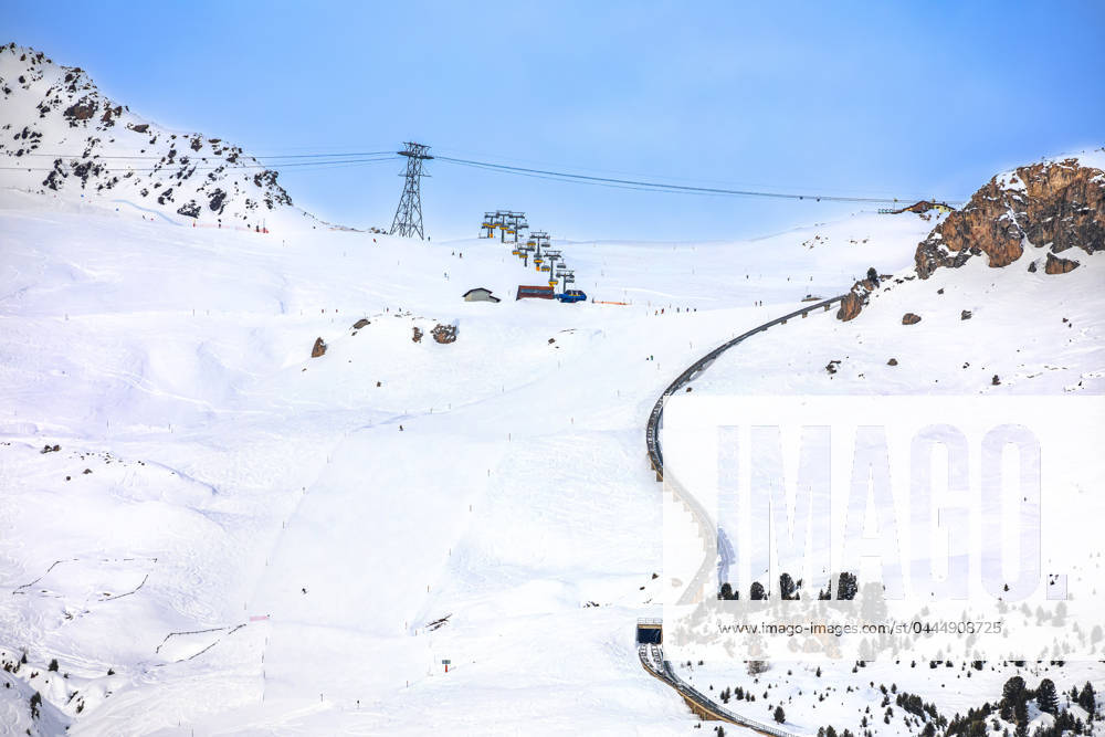 Town of Sankt Moritz luxury winter ski slope and cogwheel track view Town of Sankt Moritz luxury winter ski slope and cogwheel track view, Graubunden region of Switzerland