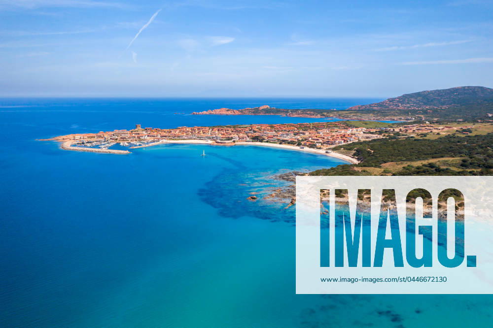 Isola Rossa colorful village aerial drone view in Sardinia, Italy Isola Rossa, Sardinia, Italy CR_UGOUSD240415-1384705-01
