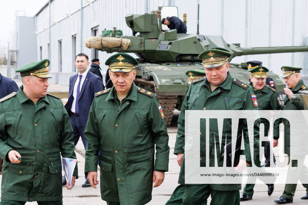 RUSSIA, OMSK REGON - APRIL 18, 2024: Russia s Defence Minister Sergei Shoigu (2nd L) inspects the fulfilment of a state defence order at one of the local military-industrial enterprises producing tanks and heavy flamethrower systems. Vadim Savitsky Russian Defence Ministry Press Office TASS 69235812