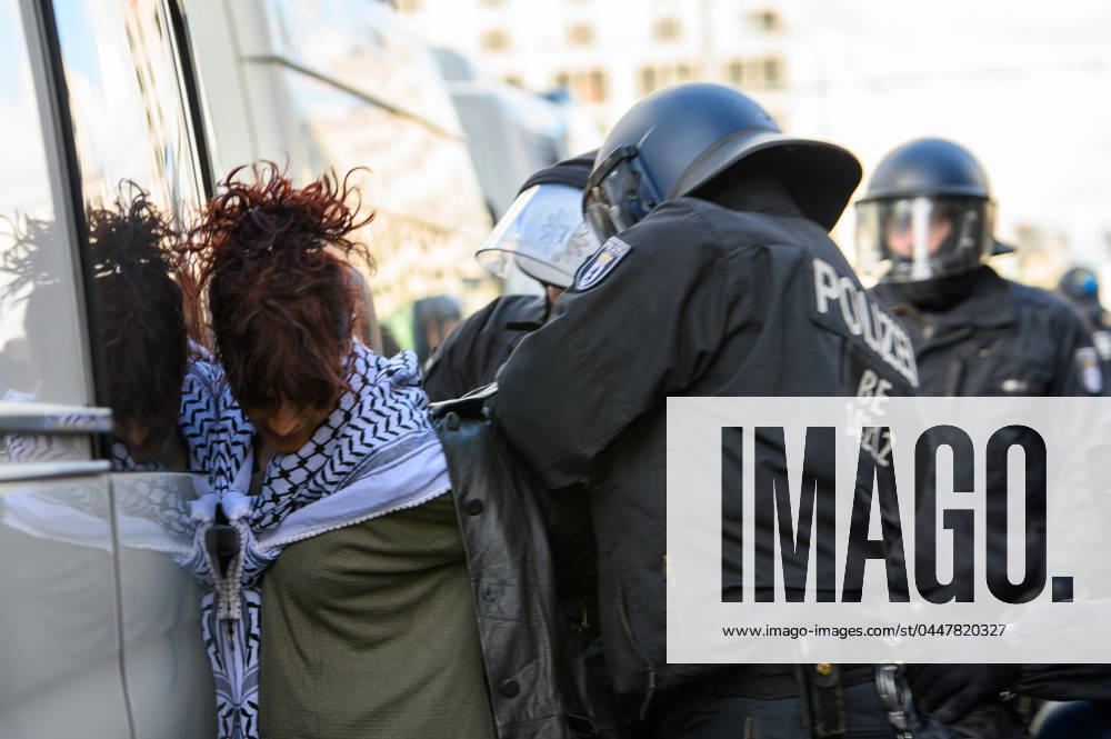 KW16 Berlin Demonstration Stop Arming Israel German police arrests a protester during a demonstration to show support to the Palestinians and protest against Germanys arms shipment to Israel on Saturday, April 20, 2024 in Berlin. Protesters gathered in Potsdamer Platz in Berlin as hundreds of left wing and Palestinian people were gathering to demonstrate under the slogan Stop arming Isreal. No weapons for Israel. Just minutes before the march started several people were arrested due to prohibited chants. Berlin Berlin Germany