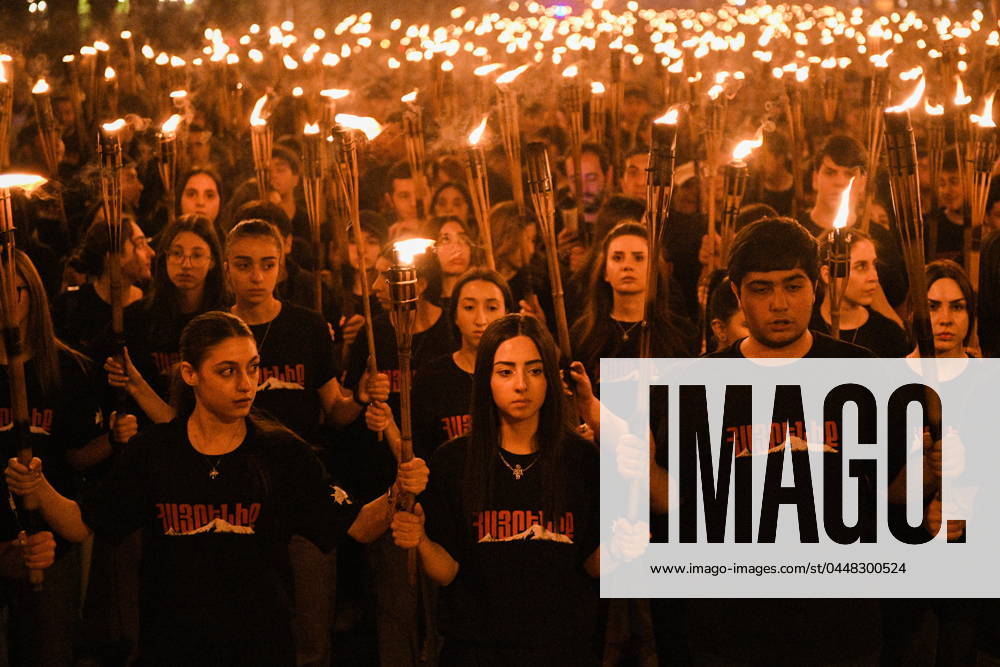RUSSIA, YEREVAN - APRIL 23, 2024: People holding torches take part in a procession on the eve of Armenian Genocide Remembrance Day to commemorate the 109th anniversary of the Armenian genocide of 1915. Alexander Patrin TASS 69366085
