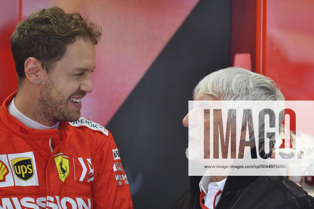 VETTEL Sebastian (ger), Scuderia Ferrari SF90, portrait chatting with ECCLESTONE Bernie (gbr), former CEO of Formula One Group during the 2019 Formula One World Championship, WM, Weltmeisterschaft Brazil Grand Prix from November 15 to 17 in Sao Paulo, Brazil Sao Paulo Brazil