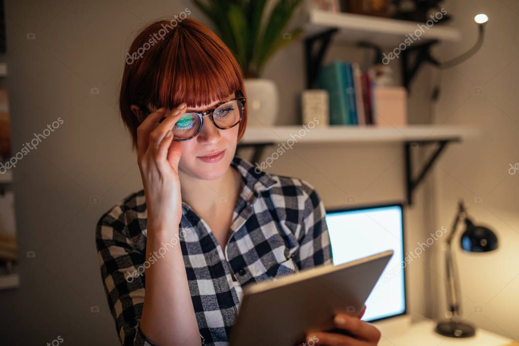 Young business woman using digital tablet. model released
