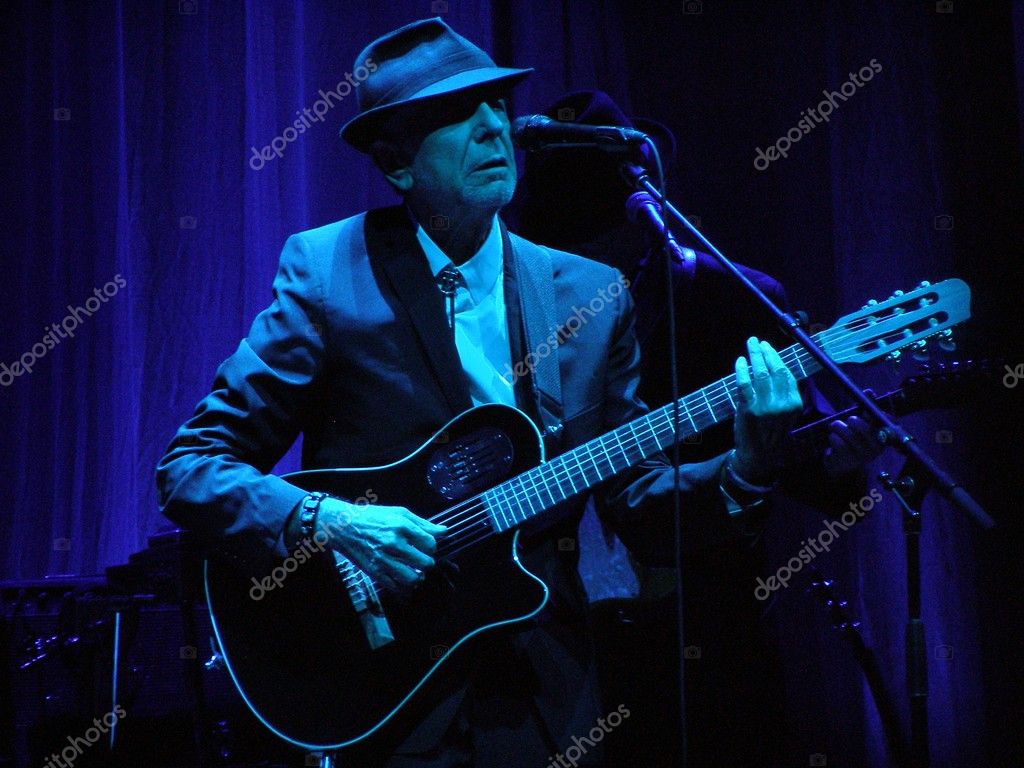 FLORENCE, ITALY - 1st SEPTEMBER 2010: Leonard Cohen sings in front of a big audience for his only Italian date of the tour in Florence, piazza Santa Croce