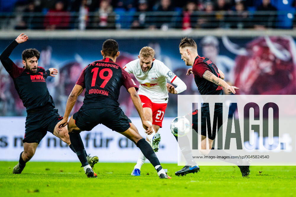 Konrad Laimer 27 RB Leipzig to 1 1 goal, Felix Uduokhai 19 FC Augsburg , Jeffrey Gouweleeuw 6 FC Augsburg during the 2019 2020 season in the 1 Football Bundesliga Men between RB Leipzig and FC Augsburg in the Red Bull Arena on 21 December 2019 in Leipzig, Saxony, Germany DFL REGULATIONS PROHIBIT ANY USE OF PHOTOGRAPHS AS IMAGE SEQUENCES AND OR QUASI VIDEO