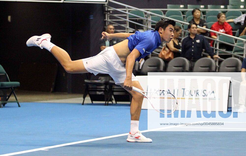 Brandon Nakashima serves during the Hawaii Open invitational tournament match between Christian Harrison (USA) and Brandon Nakashima (USA) at the Stan Sheriff Center in Honolulu, HI - CSM. Tennis 2019: Hawaii Open DEC26 - ZUMAc04_ 20191226_zaf_c04_128