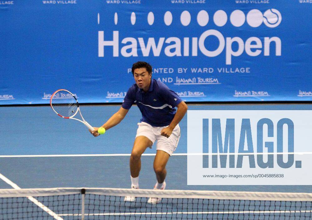 Brandon Nakashima runs to the net during the Hawaii Open invitational tournament match between Christian Harrison (USA) and Brandon Nakashima (USA) at the Stan Sheriff Center in Honolulu, HI - CSM. Tennis 2019: Hawaii Open DEC26 - ZUMAc04_ 20191226_zaf_c04_132