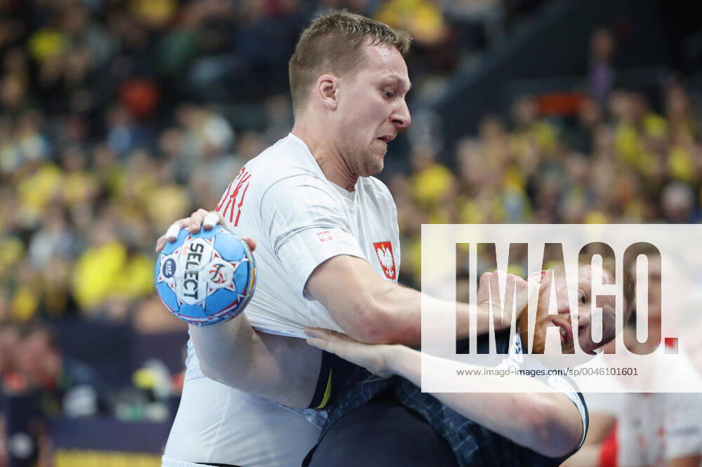Poland s Rafal Przybylski against Sweden s Jim Gottfridsson during the Men s European Handball Championship, preliminary round Group F, match between Poland and Sweden at Scandinavium in Gothenburg, Sweden, on Tuesday Jan 14, 2020 Photo Adam Ihse TT code 9200 GOTHENBURG SWEDEN