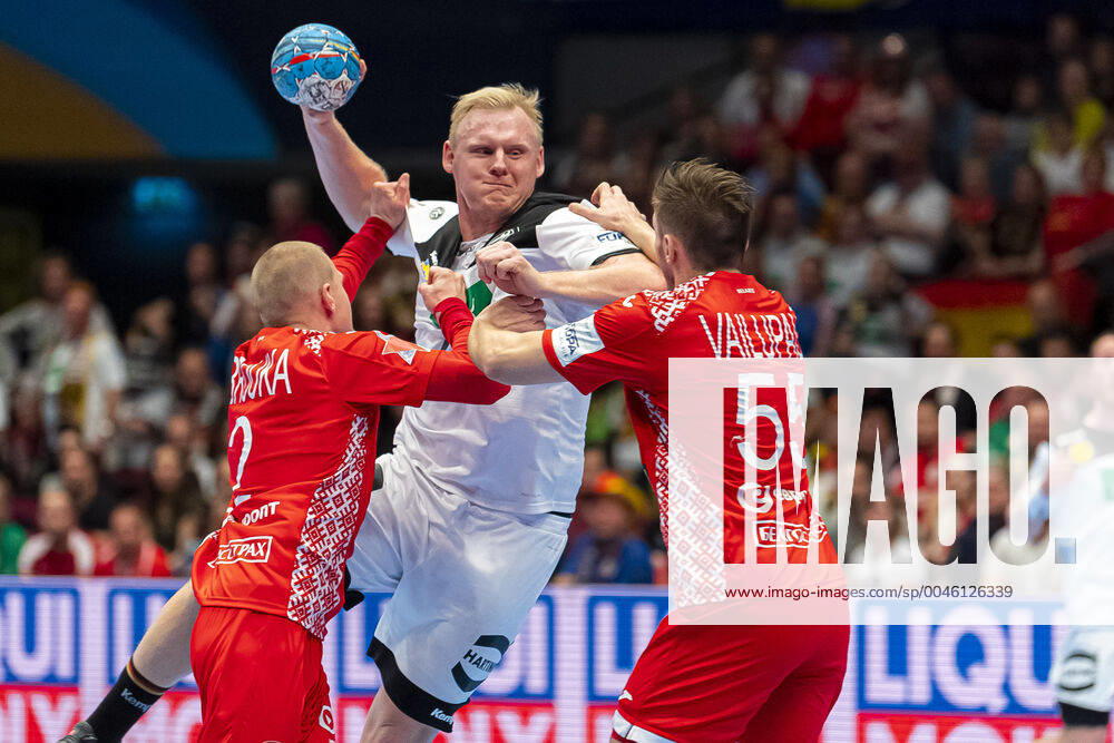 Handball, Men EM 2020, Main Round, Group 1, Belarus Germany violet in duel Ivan Brouka Belarus and Patrick Wiencek Germany THW Kiel , Mikita Vailupau Belarus Vienna Stadthalle Vienna Austria