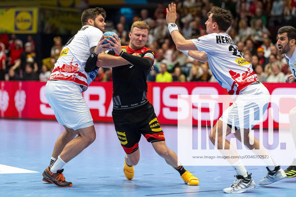 Handball, Men EM 2020, Main Round, Group 1, Austria Germany from left to right Tobias Wagner Austria and Philipp Weber Germany SC DHfK Leipzig , Lukas Herburger Austria Vienna Stadthalle Vienna Austria