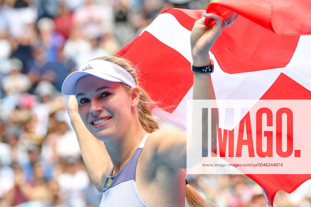 CAROLINE WOZNIACKI (DEN) flys her country s flag as she retires from tennis after losing to ONS JABEUR (TUN) on Melbourne Arena in a Women s Singles 3rd round match on day 5 of the Australian Open 2020 in Melbourne, Australia. Cal Media. JABEUR won 75 36 75 Tennis 2020: Australian Open Day 5 - ZUMAc04_ 20200124_zaf_c04_065