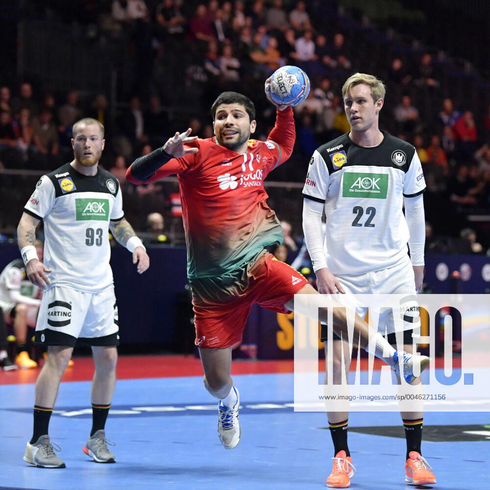Portugal s Belone Moreira C in action as Germany s Patrick Zieker L and Marian Michalczik look on during the match for fifth sixth place between Germany and Portugal during the Men s European Handball Championship in Stockholm, Sweden, on Jan 25, 2020 Stockholm Sverige