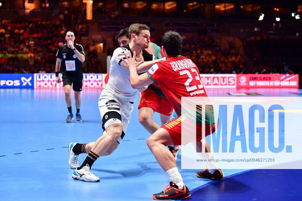 European Handball Championship Match for Rank 5, 25 01 2020, Germany Portugal, Tele2 Arena, Stockholm David Schmidt Germany, 77 Alexandre Cavalcanti Portugal, 24 Diogo Branquinho Portugal, 23 Attack Half Right Action, 25 01 2020, Stockholm Sweden Sweden, Handball, EM 2020, Match for Rank 5, Germany Portugal