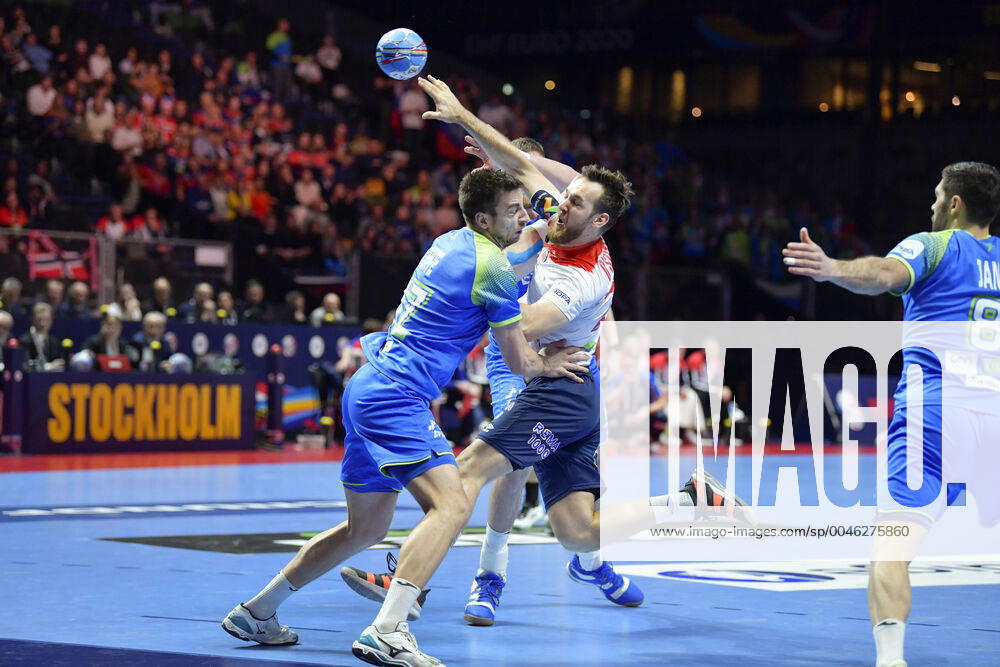 Norway s Christian O Sullivan C scores past Slovenia s Nejc Cehte during the bronze medal match between Slovenia and Norway during the Men s European Handball Championship in Stockholm, Sweden, on Jan 25, 2020 Stockholm Sverige