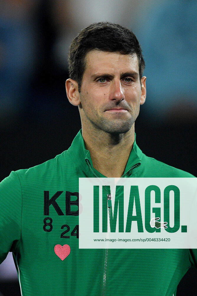 Bilder des Jahres 2020, Sport 01 Januar AUSTRALIAN OPEN DAY 9, Novak Djokovic of Serbia wears the initials and numbers of Kobe Bryant on his jacket after winning his fifth round match against Milos Raonic of Canada on day nine of the Australian Open tennis tournament at Rod Laver Arena in Melbourne, Tuesday, January 28, 2020. ( NO ARCHIVING, , NO USE IN BOOKS WITHOUT CONSENT MELBOURNE VIC AUSTRALIA