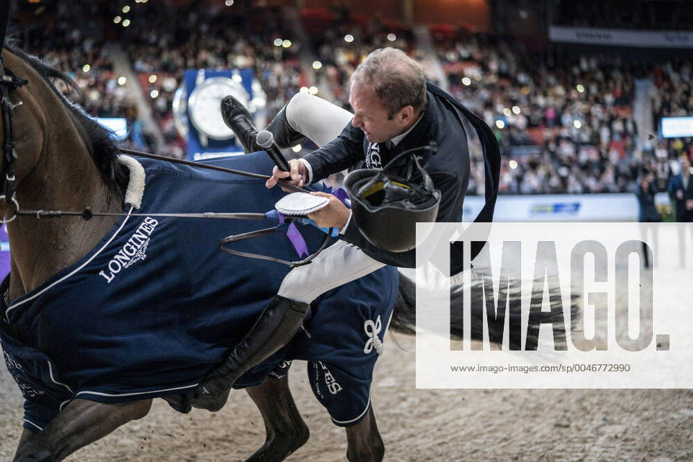 Geir Gulliksen of Norway falls of his horse Groep Quatro when he rides a lap of honor after winning the FEI Jumping World Cup competition during Gothenburg Horse Show at Scandinavium in Gothenburg, Sweden February 23, 202 GOTHENBURG Sweden
