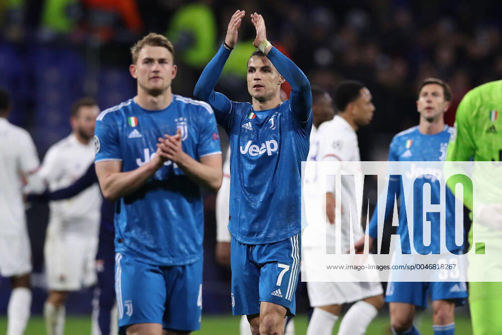 Juventus s Portuguese striker Cristiano Ronaldo and Dutch defender Matthijs De Ligt applaud the fans after the final whistle of the UEFA Champions League match at the Groupama Stadium, Lyon. Picture date: 26th February 2020. Picture credit should read: Jonathan Moscrop Sportimage . SPI-0491-0015