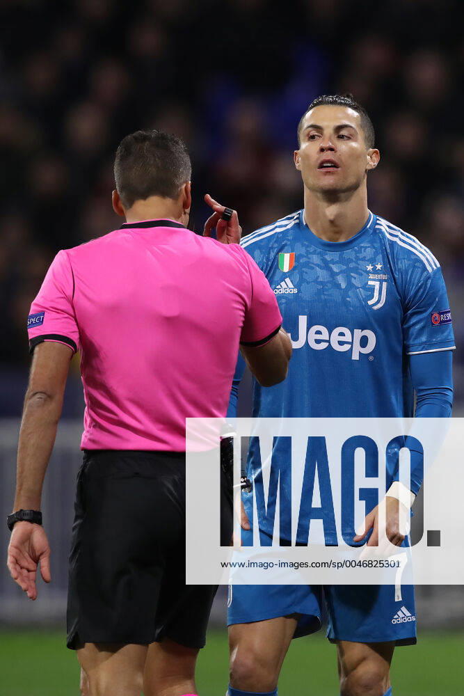 Juventus s Portuguese striker Cristiano Ronaldo reacts in front of Spanish referee Gil Manzano during the UEFA Champions League match at the Groupama Stadium, Lyon. Picture date: 26th February 2020. Picture credit should read: Jonathan Moscrop Sportimage . SPI-0491-0093