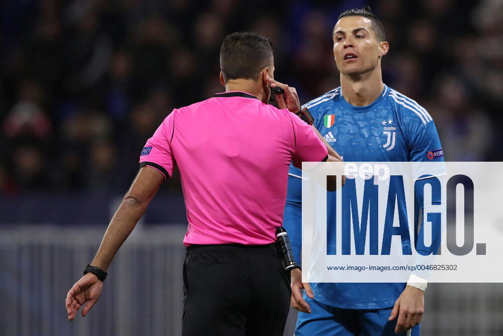 Juventus s Portuguese striker Cristiano Ronaldo reacts in front of Spanish referee Gil Manzano during the UEFA Champions League match at the Groupama Stadium, Lyon. Picture date: 26th February 2020. Picture credit should read: Jonathan Moscrop Sportimage . SPI-0491-0094