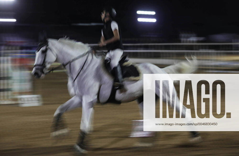 Gaza City, Gaza Strip, Palestinian Territory: Palestinian competitors ride their horses during the first championship in jump barriers for the year 2020, on February 27, 2020 Middle East News - February 27, 2020 - ZUMAap3_ 97337259st