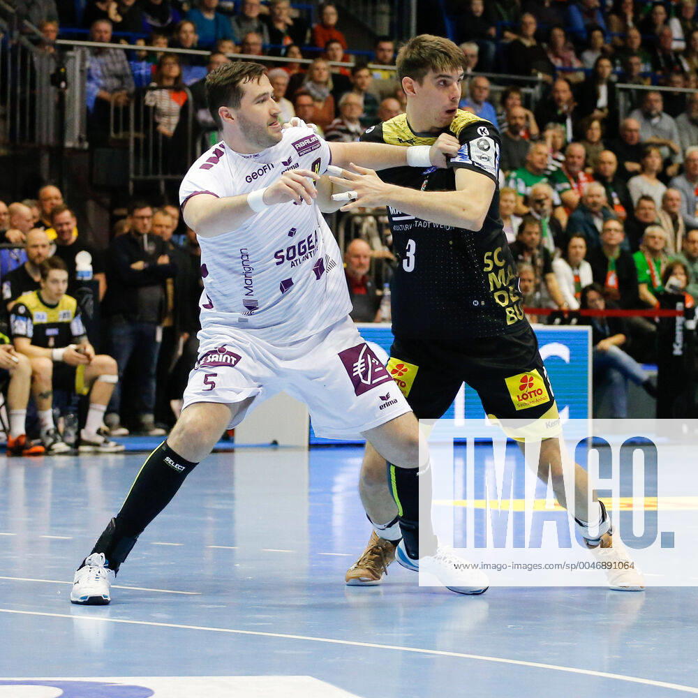 Handball EHF Cup, SC Magdeburg HBC Nantes, from l Senjamin Buric, Piotr Chrapkowski Magdeburg, 3 Duel, fight, tackle GETEC Arena