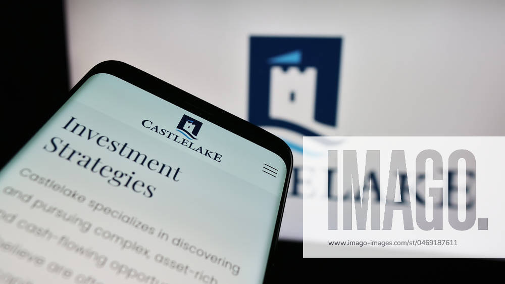 Smartphone with website of US investment management company Castlelake LP in front of business logo. Stuttgart, Germany - 11-29-2023: Smartphone with website of US investment management company Castlelake LP in front of business logo. Focus on top-left of phone display.