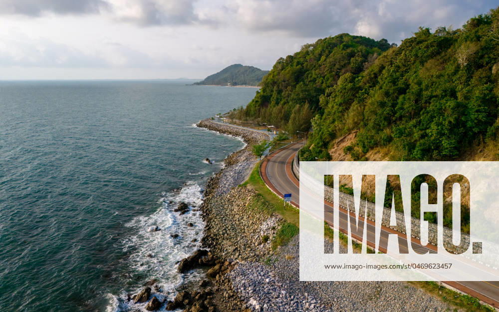 Chantaburi Province Thailand, Road along the beach and ocean car driving on the curved road of Thailand. road landscape in summer. it s nice to drive on the beachside highway. Chantaburi Province Thailand, summer road trip alongside the ocean