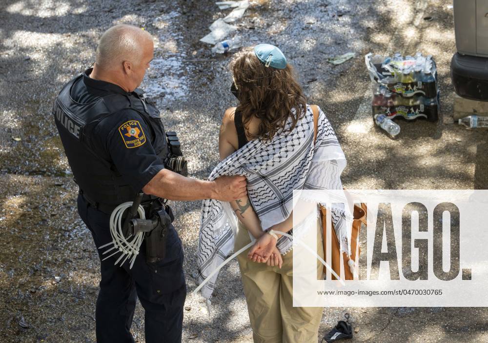 Police arrest Pro-Palestinian protesters as the University of Texas at Austin is rocked by demonstrations for a third straight day when dozens of students and supporters attempted to set up a tent city on the South Lawn April 29, 2024. Texas DPS, Austin police and UT police reported taking away at least protesters and clearing the site Austin United States - ZUMAd150 20240429_znp_d150_032