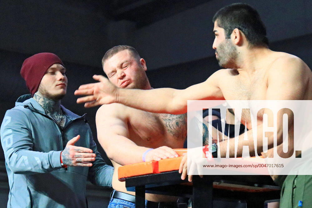 KW11 KRASNOYARSK, RUSSIA - MARCH 9, 2020: Men take part in a face slapping contest as part of the 5th Siberian Power Show held at the Siberia International Exhibition and Business Centre; the festival hosts 30 sporting events including arm wrestling, CrossFit, bikini fitness and strongman competitions. Andrei Samsonov TASS TS0D1552
