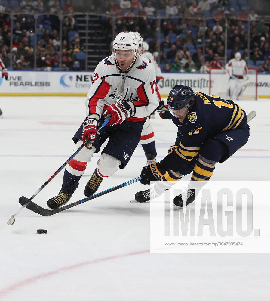 Washington Capitals left wing Ilya Kovalchuk (17) skates the puck past Buffalo Sabres defenseman Jake McCabe (19) during the third period of play in the NHL, Eishockey Herren, USA hockey game between the Washington Capitals and Buffalo Sabres at the KeyBank Center in Buffalo , N.Y. (Nicholas T. LoVerde Cal Media) Buffalo USA - ZUMAc04_ 20200309_zaf_c04_428