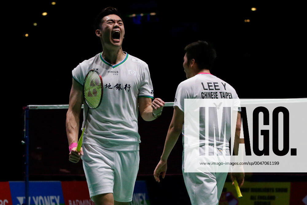 KW11 (200314) -- LONDON, March 14, 2020 (Xinhua) -- Chinese Taipei s Wang Chi-Lin (L) and Lee Yang celebrate winning a point during the men s doubles quarterfinal match with China s Huang Kaixiang and Liu Cheng at All England Badminton 2020 in Birmingham, Britain on March 13, 2020. (Photo by Tim Ireland Xinhua) (SP)BRITAIN-BIRMINGHAM-BADMINTON-ALL ENGLAND-DAY 3