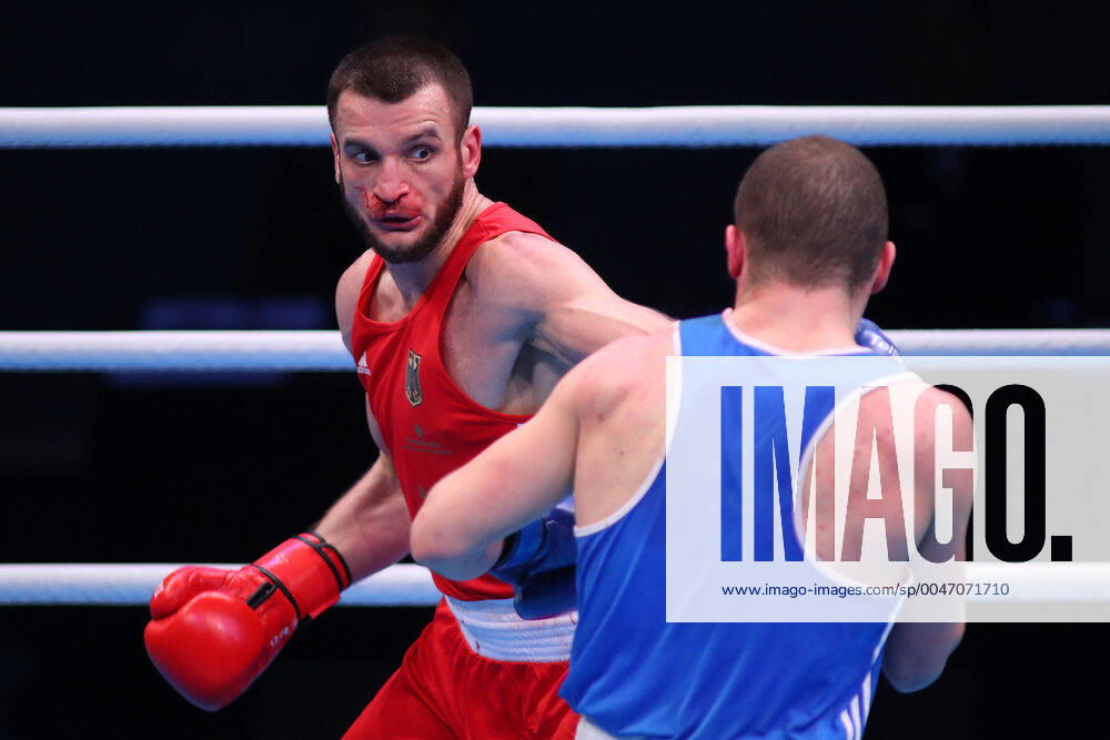 Bilder des Jahres 2020, Sport 03 März Ibragim Bazuev of Germany, wearing red and Stepan Hrekul of Ukraine, wearing blue competing in the Menâ€⠢s Light-heavyweight preliminaries during The Road to Tokyo, Olympic Boxing Qualification, at The Copperbox, Queen Elizabeth Olympic Park, Stratford, London. March 15 2020. ( Mitchell Gunn Espa-Images) London USA - ZUMAcs12 20200315_zaf_cs12_037