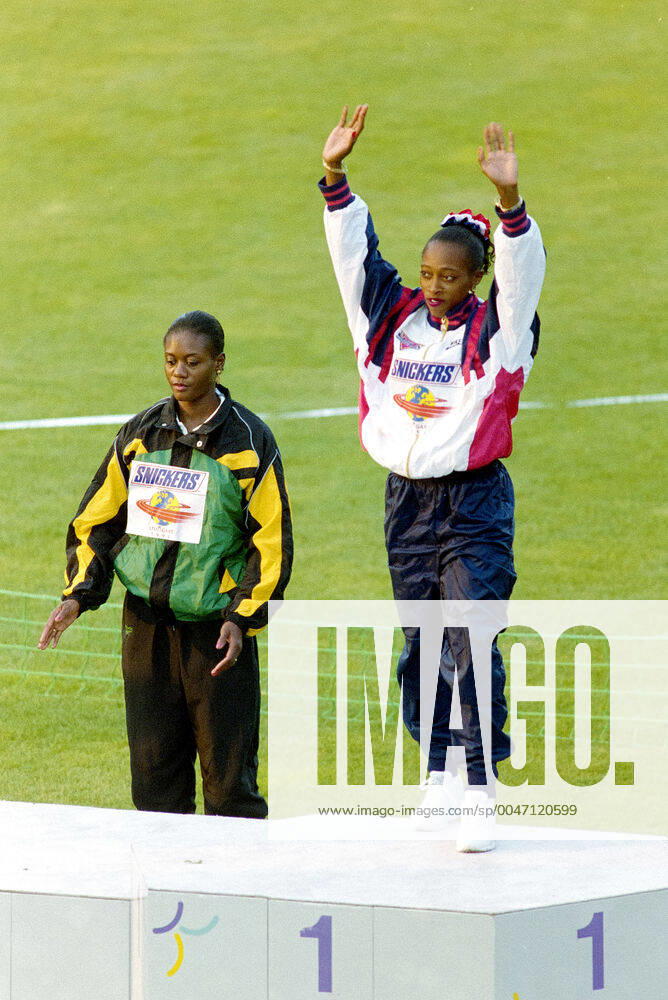 Athletics, World Athletics Championships Gold medalist Gail Devers of USA and silver medalist Merlene Ottey of Jamaica reacts during the prize ceremony for womens 100 m at The World Athletics Championships on August 17, 1993 in Stuttgart, Germany BILDBYRAN,