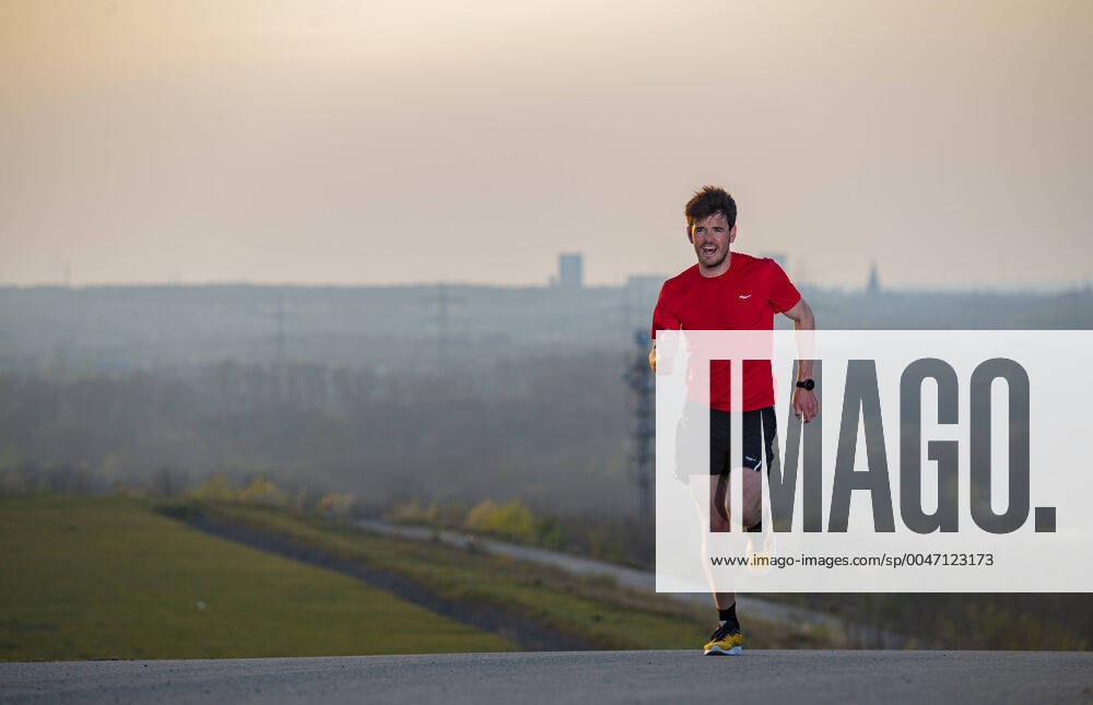 Professional triathlete Patrick Dirksmeier at the mountain running training on the Halde Hoheward between Herten and Recklinghausen in NRW on 07 04 2020 Patrick Dirksmeier runs up the Halde,