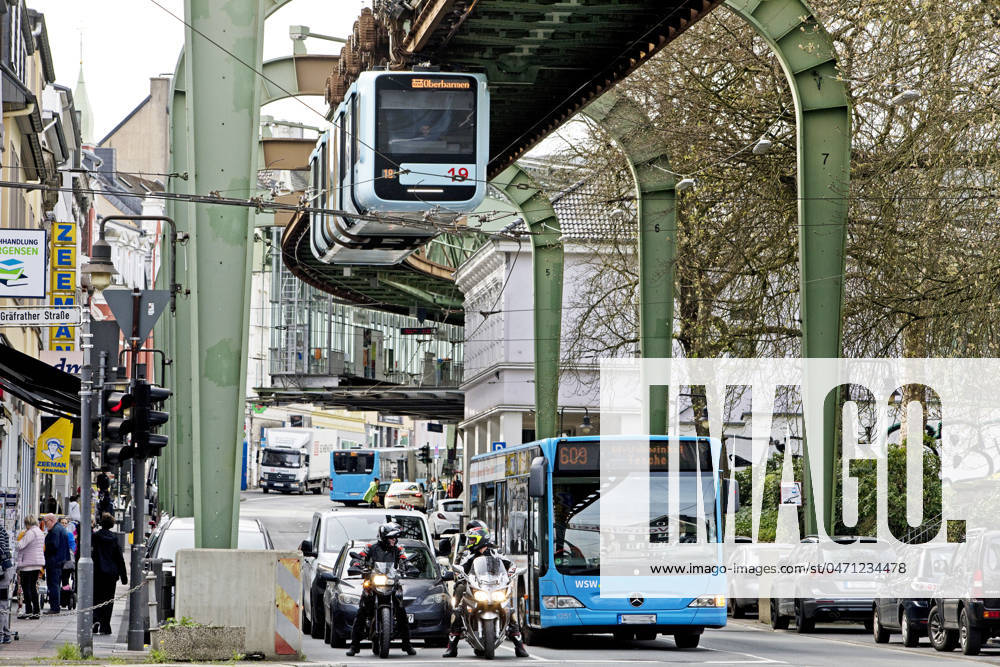 Traffic with Suspension railroad, Bus, Cars us Motorcycles in Vohwinkel,, Germany, NRW, Bergisches Country, Wuppertal Traffic With Suspension railroad, bus, Cars and Motorcycles in Vohwinkel, Germany, North Rhine Westphalia, Bergisches Country, Wuppertal BLWS708999
