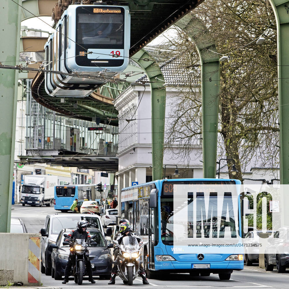 Traffic with Suspension railroad, Bus, Cars us Motorcycles in Vohwinkel,, Germany, NRW, Bergisches Country, Wuppertal Traffic With Suspension railroad, bus, Cars and Motorcycles in Vohwinkel, Germany, North Rhine Westphalia, Bergisches Country, Wuppertal BLWS709000