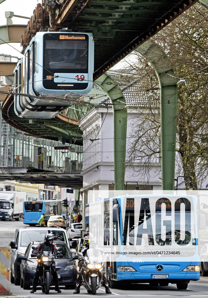 Traffic with Suspension railroad, Bus, Cars us Motorcycles in Vohwinkel,, Germany, NRW, Bergisches Country, Wuppertal Traffic With Suspension railroad, bus, Cars and Motorcycles in Vohwinkel, Germany, North Rhine Westphalia, Bergisches Country, Wuppertal BLWS709001