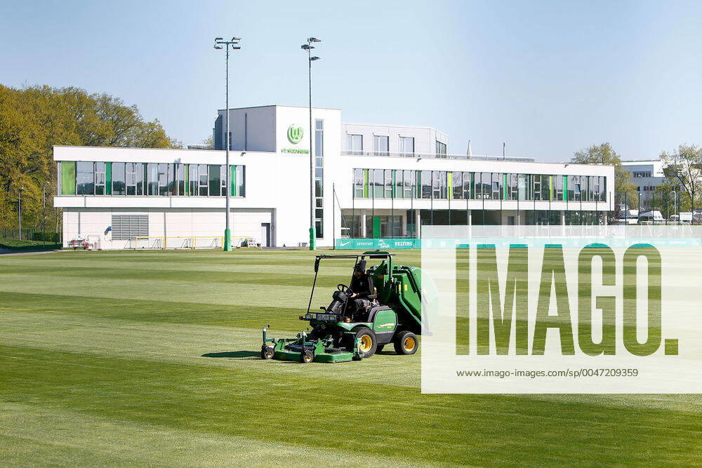 Consequences of the Corona Virus in Wolfsburg, the turf of the VfL Wolfsburg training ground is mowed The club prepares for the continuation of the Bundesliga season with non-public training sessions