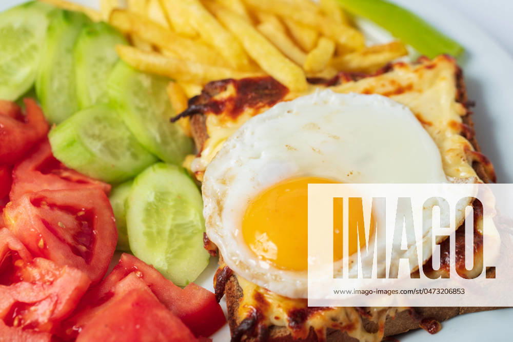 Breakfast. French cuisine. Croque madame sandwich close up on the table. Breakfast. French cuisine. Croque madame sandwich close up on the table. High quality photo