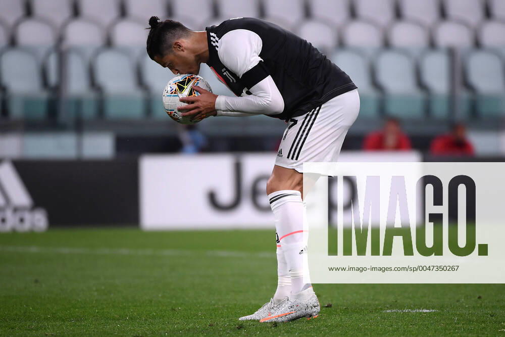 KW24 Cristiano Ronaldo of Juventus kisses the ball while he prepares to shoot a penalty during the second leg of Italy Cup semifinal between Juventus and Milan at Juventus Stadium in Turin ( Italy ), June 12th, 2020. Play resumes behind closed doors following the outbreak of the coronavirus disease. Photo Federico Tardito Insidefoto federicoxtardito