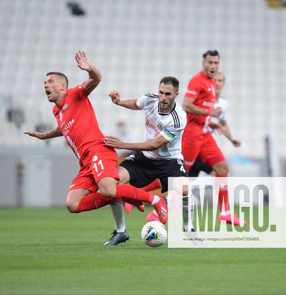 KW24 Victor Ruiz (R) of Besiktas and Lukas Podolski of Antalyaspor during the Turkish Super League football match between Besiktas and Antalyaspor at Vodafone Park Stadium in Istanbul , Turkey on June 13 , 2020.