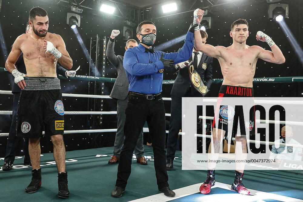 KW25 MOSCOW, RUSSIA – JUNE 15, 2020: Russian boxer Khariton Agrba (R) is announced winner of a WBA Super Lightweight Continental title bout against Armenian boxer Manuk Dilanyan (L) at a boxing event organised by Liga Stavok betting company. The boxing event, which included two boxing bouts and took place without spectators, is the first to be held in Moscow after the lockdown, which was imposed in Moscow from 30 March to 9 June in connection with the novel coronavirus pandemic. Ruslan Kolesnikov Boxing Federation of Russia TASS TS0DCAC1