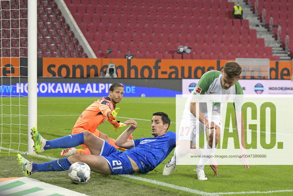 FC Augsburg Hoffenheim 17 06 2020, Soccer 1 Bundesliga 2019 2020, 32 matchday, FC Augsburg TSG 1899 Hoffenheim, in the WWK Arena Augsburg L R Goalkeeper Oliver Baumann TSG 1899 Hoffenheim and Benjamin Hübner TSG 1899 Hoffenheim against Alfred Finnbogason FC Augsburg Photo Bernd Feil MIS Pool via Eibner Press photo Only for journalistic purposes Only for editorial use According to the regulations of the DFL Deutsche Fußball Liga, it is prohibited to use or have used photographs taken in the stadium and or of the match in the form of sequence images and or video-like photo sequences DFL regulations prohibit any use of photographs as image sequences and or quasi video National and international NewsAgencies OUT Augsburg WWK Arena Bayern Deutschland Poolfoto MIS-Sportpressefoto ,