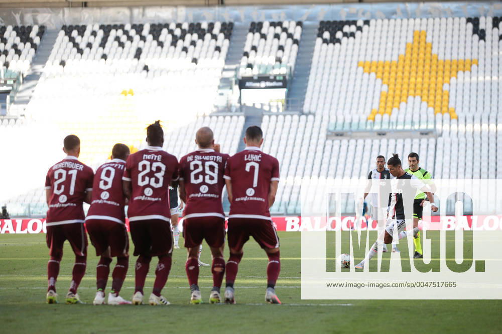 Juventus s Portuguese striker Cristiano Ronaldo scores from a second half free kick to give the side a 3-1 lead during the Serie A match at Allianz Stadium, Turin. Picture date: 4th July 2020. Picture credit should read: Jonathan Moscrop Sportimage . SPI-0579-0012