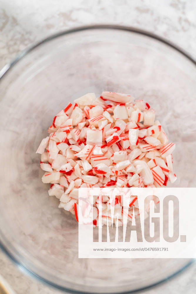 Homemade candy cane fudge Measured ingredients in glass mixing bowls to make candy cane fudge.
