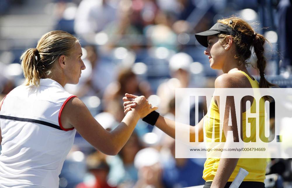 Svetlana Kuznetsova shakes hands with Julia Goerges after their first round match at the US Open NYP20090901108
