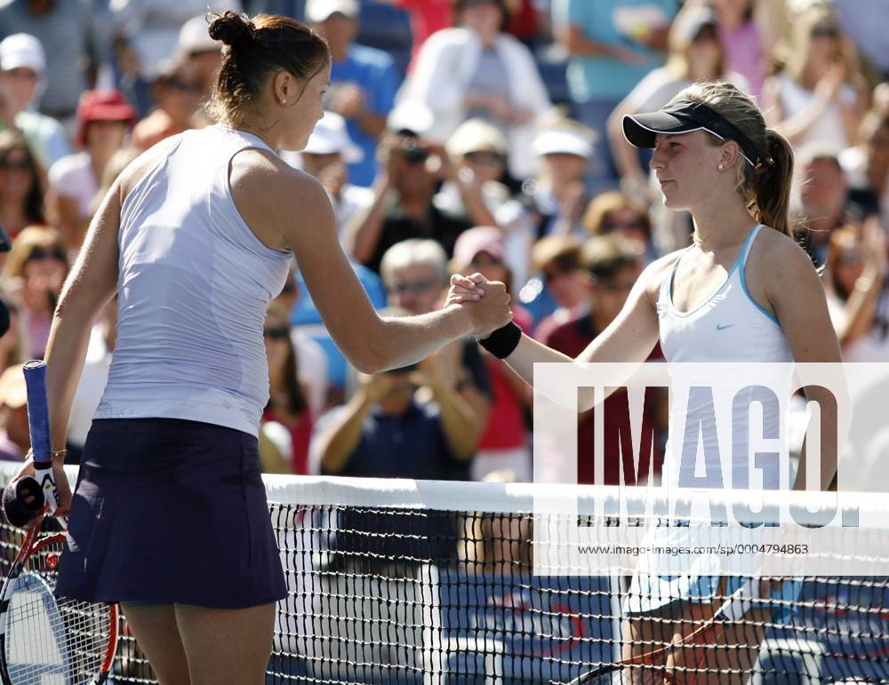 Number 1 seed Dinara Safina and Olivia Rogowska (R) shake hands after their first round match at the US Open NYP20090901124