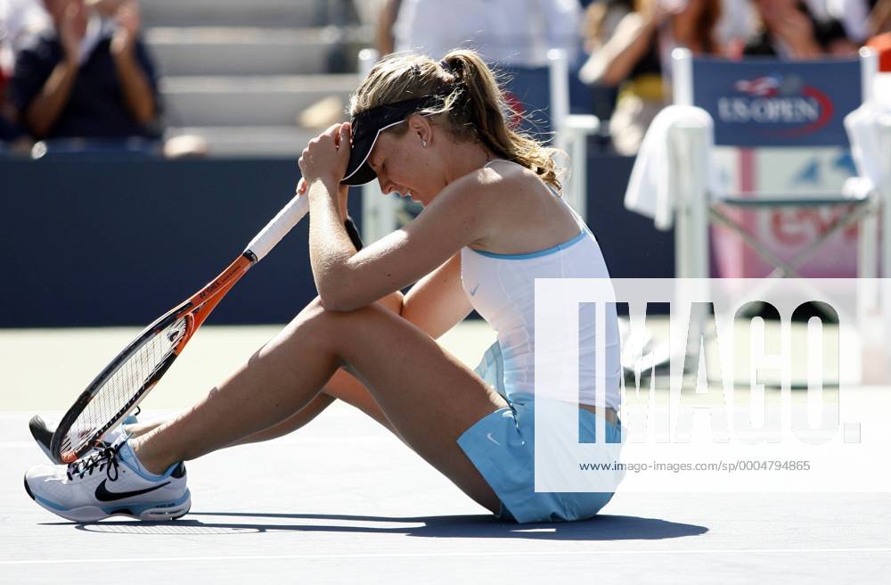 Olivia Rogowska falls to the ground after losing a point in the third set of her first round match at the US Open NYP20090901127